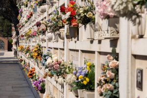 Columbarium wall covered in flowers