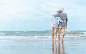 couple standing by the ocean