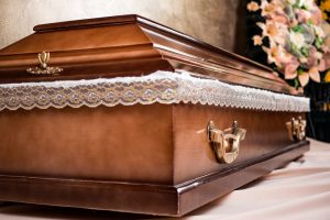 brown casket with lace lining