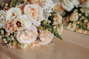 pink and white flowers at a funeral