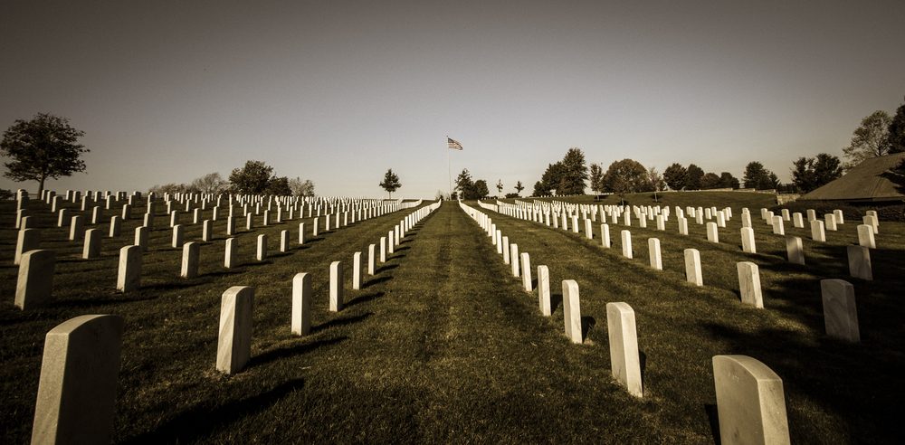 Looking down a row at a vetrans national cemetery