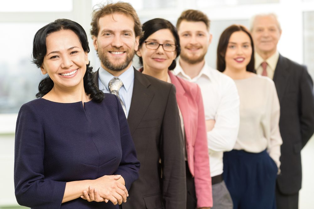 pleasant-looking group of professionals, diverse in age, gender, and ethnicity