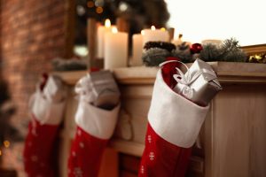 Red stockings on the mantle, one of the more common western Christmas traditions