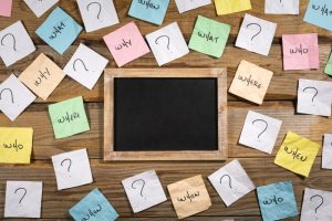 Post-it notes with questions written on them