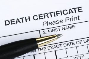 Top of official death certificate document with black pen
