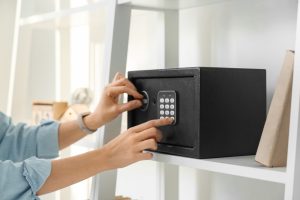 Woman opening at at-home safe