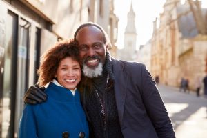 Man and wife smiling at camera