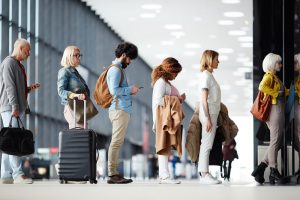 People standing in line at the airport