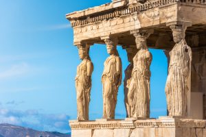 Statues of women acting as columns on an Ancient Greek structure