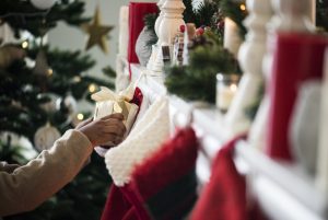 Christmas stockings hanging from a mantle