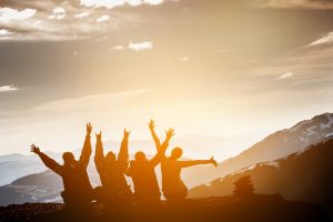 group of friends watching the sunset