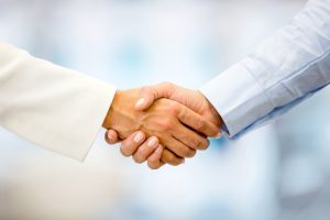 Two people shaking hands