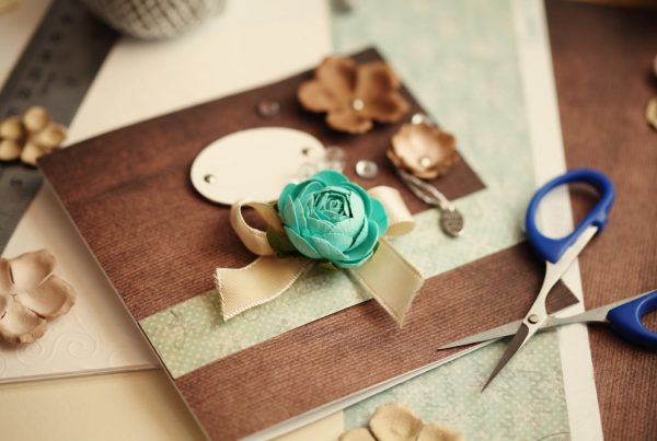 scrapbook on a table with scissors