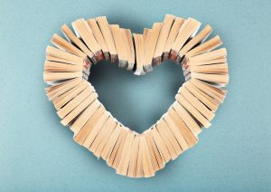 Looking at books from above, arranged so that they create a heart