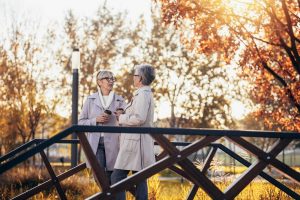 friends catching up outside during the fall