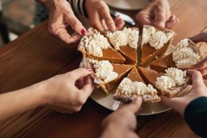 friends sharing pumpkin pie together