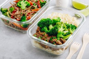 beef and broccoli meal in a plastic container