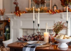 Table with decorations and candles on it