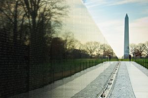 Vietnam Memorial Wall with Washington Monument in background