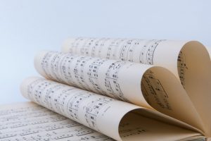 Music sheets folded into half circles