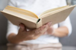 Man holding an open book