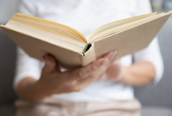 Man holding an open book