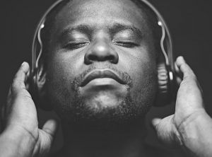 man listening to music with his eyes closed