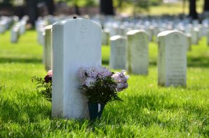 Veteran's headstone with flowers