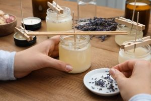 Making commemorative candle at home with special scents and added lavender
