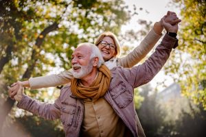older couple having fun outside