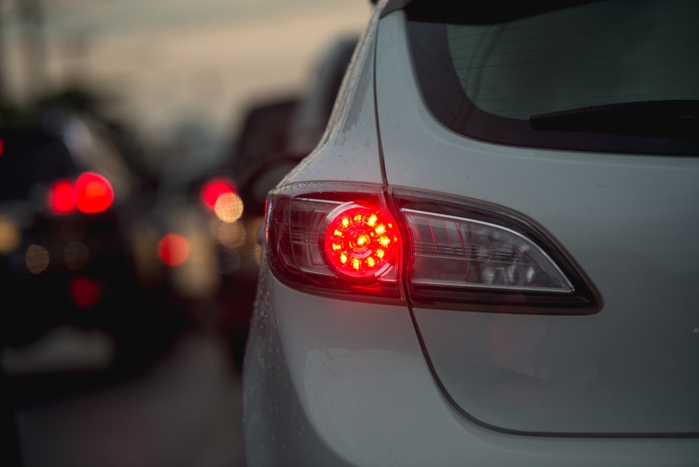 car driving with brake lights lit up
