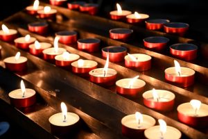 Lit memorial candles at a church or service; funerals aren't one-size-fits-all