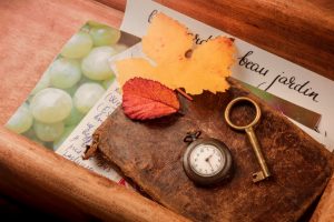 Letters, watch, and other items you might find in a memory box