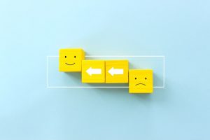 Small yellow blocks that show moving from sad to happy