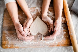 Hands baking together