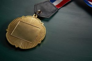 Gold medal on a table.