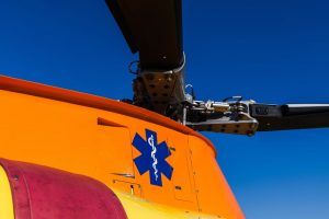 Close up of a helicopter with the Star of Life symbol on it