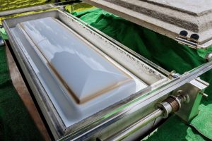 A casket sitting in a burial vault