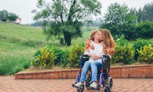 A mother and daughter enjoying a patio